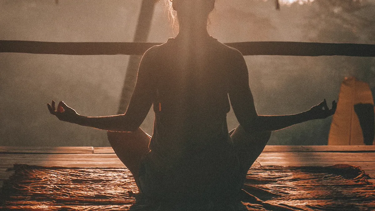 Standing 5-Minute Morning Stretch by the Window 5 minute morning stretch: standing calf and shoulder stretch by a sunlit kitchen window