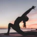 gentle morning stretches: woman doing a gentle stretch on a cozy living room rug in morning light