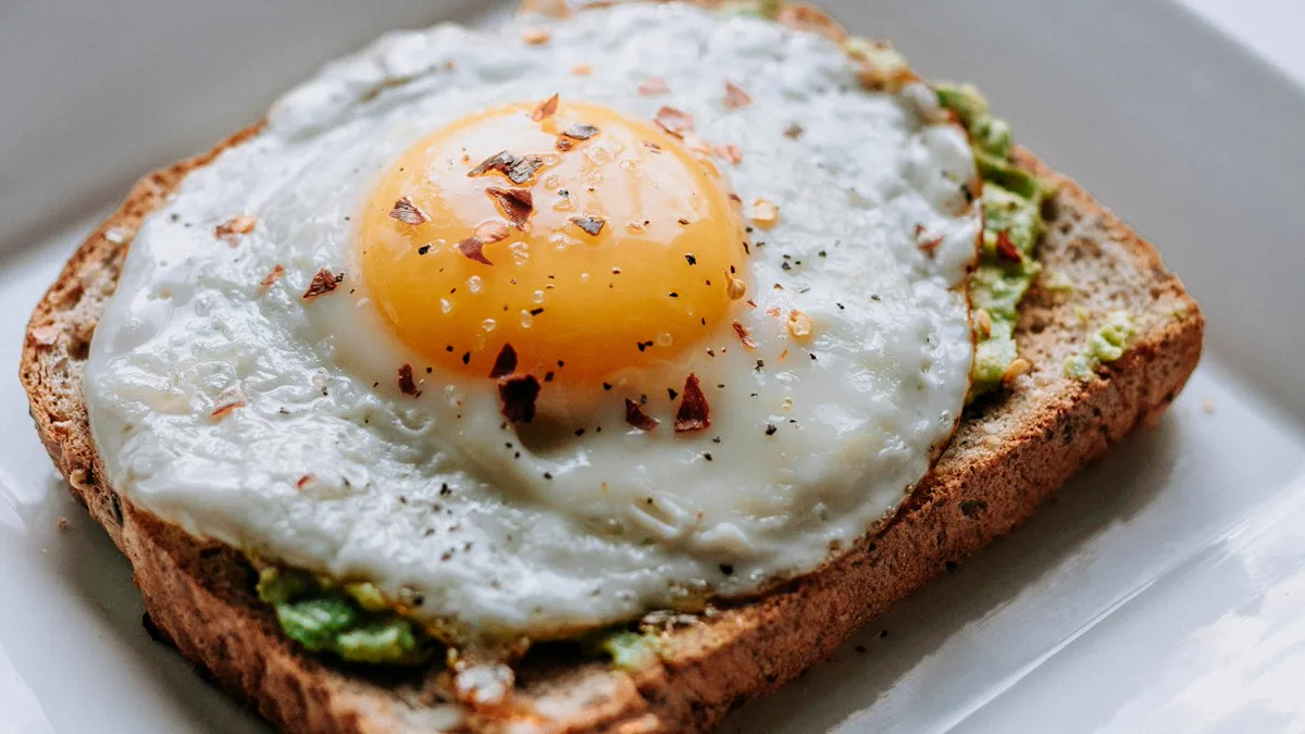 Batch Prepared Breakfast Sandwiches on the Counter make ahead breakfast sandwiches: toasted english muffins with baked egg patties and cheese