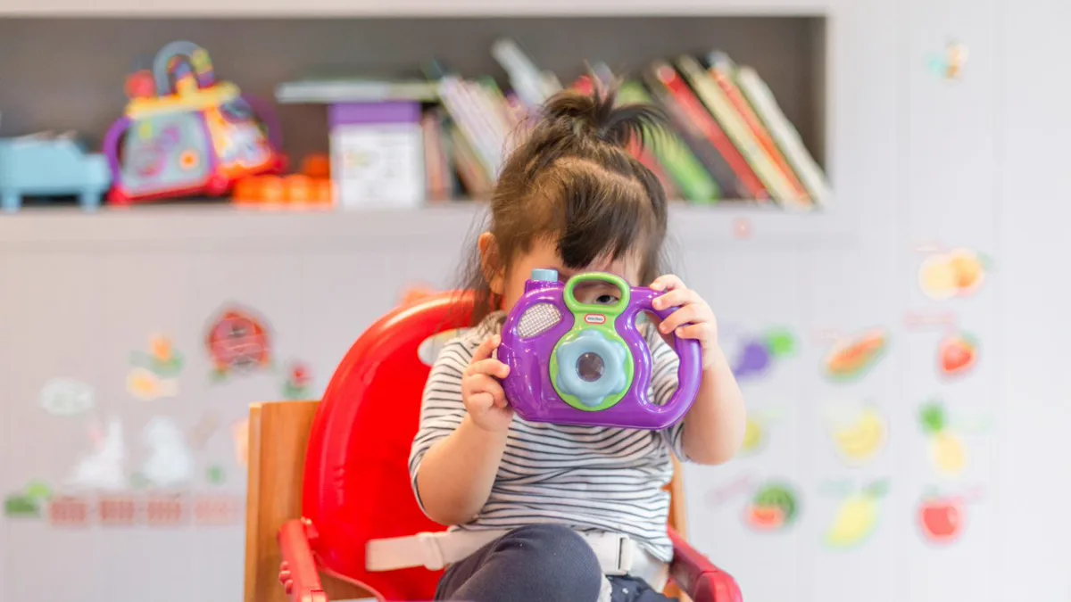 Preschooler Practicing Independence with Shoes morning routine for preschoolers: young child putting on sneakers by the hallway bench