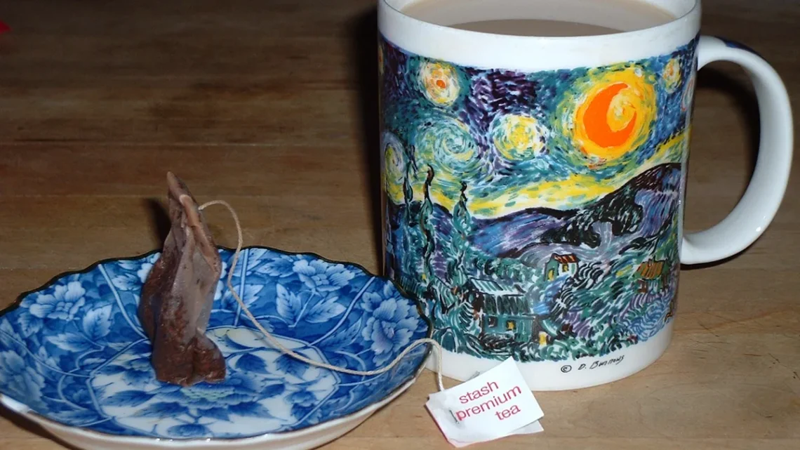 somatic check-ins for parents practicing gentle morning grounding with warm tea