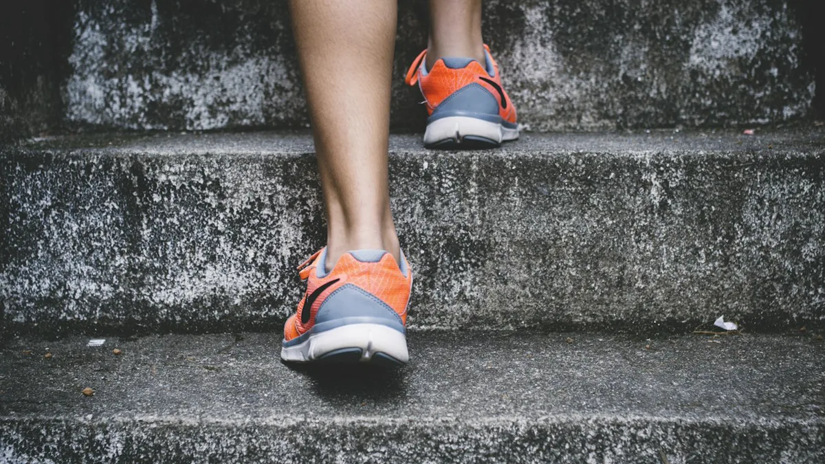 walking routine for beginners: comfortable walking sneakers on a sunlit paved neighborhood park path